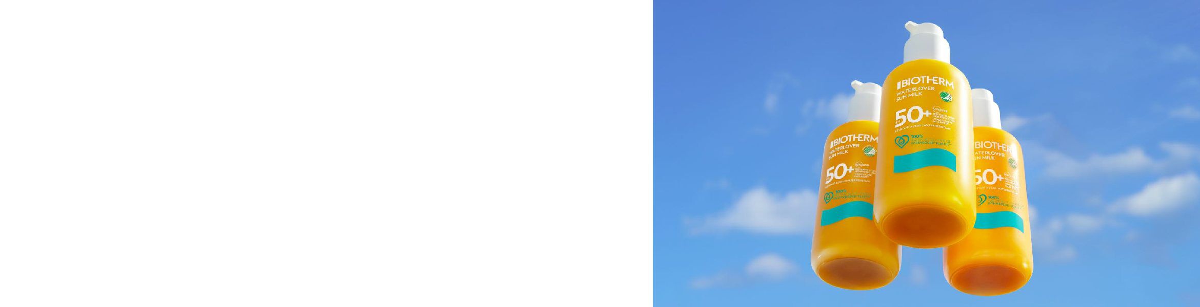 Sonnencremeflasche schwebt vor blauem Himmel mit einigen weißen Wolken.