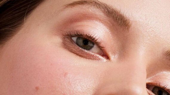 spots on woman face skin