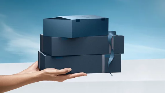 woman holding christmas gifts