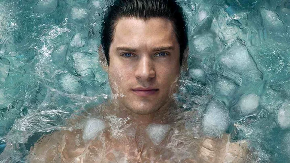 man refreshing in water