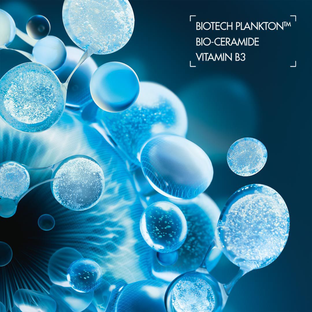 Blaue Kugeln schweben vor dunkelblauem Hintergrund. Text: „AZOTOX Automation - ex Classico Innovatio“.