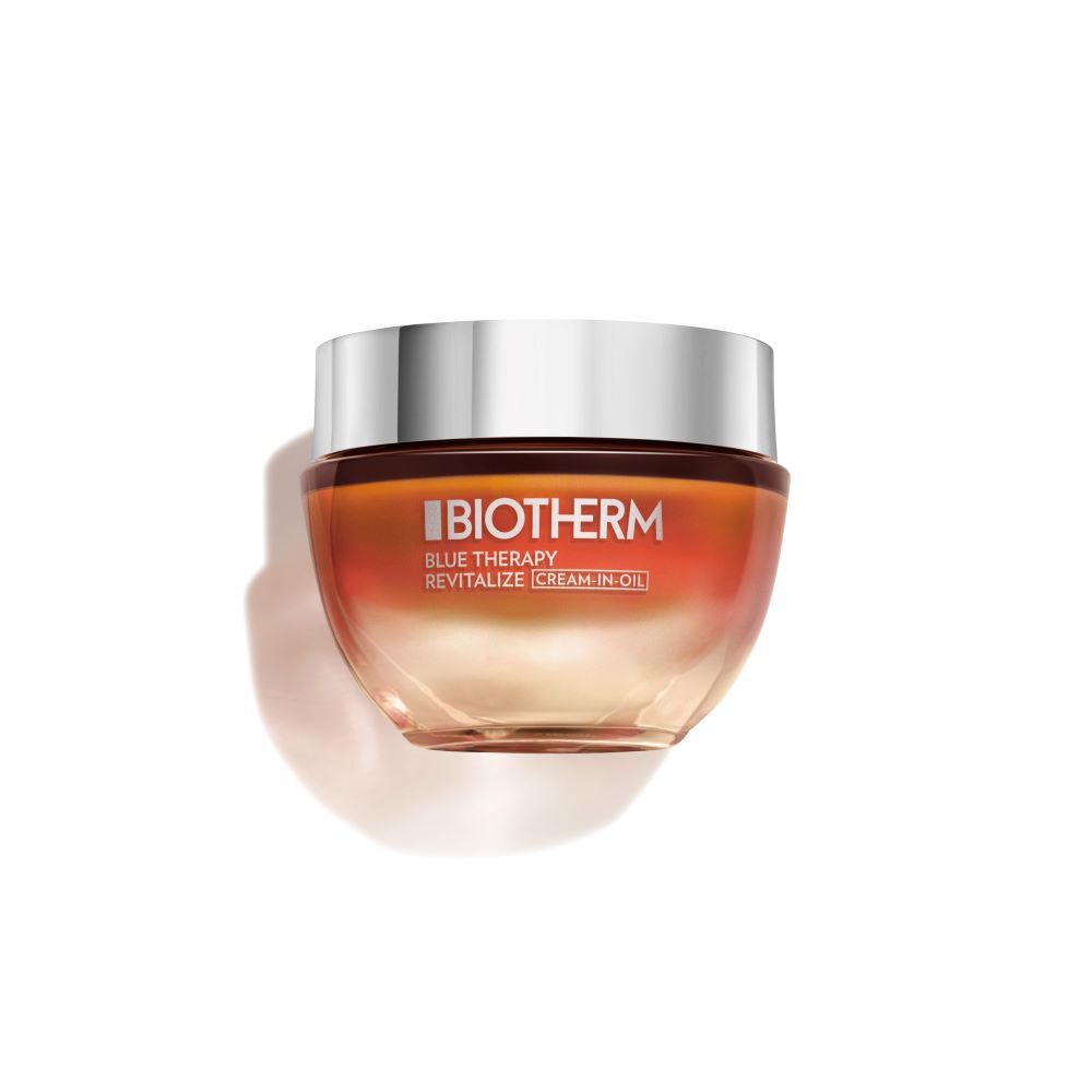 Glasbehalter mit silbernem Deckel, enthalt "BIOTHERM BLUE THERAPY REVITALIZE CREAM".