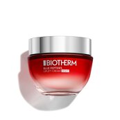 Roter Cremetiegel mit silbernem Deckel, schwebt vor weißem Hintergrund. Text: "L'OREAL Revitalift".