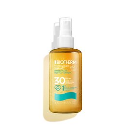 Sonnencremespray in Flasche auf weißem Hintergrund. Text: "BIODERMA Photoderm BRONZ SPF 30".
