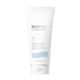 Weiße Tube mit der Aufschrift "BIOTHERM Lait de Douche" auf hellem Hintergrund.