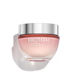 Ein Glasbehalter mit silbernem Deckel, Aufschrift: "BIOTHERM", steht auf einer weißen Flache.